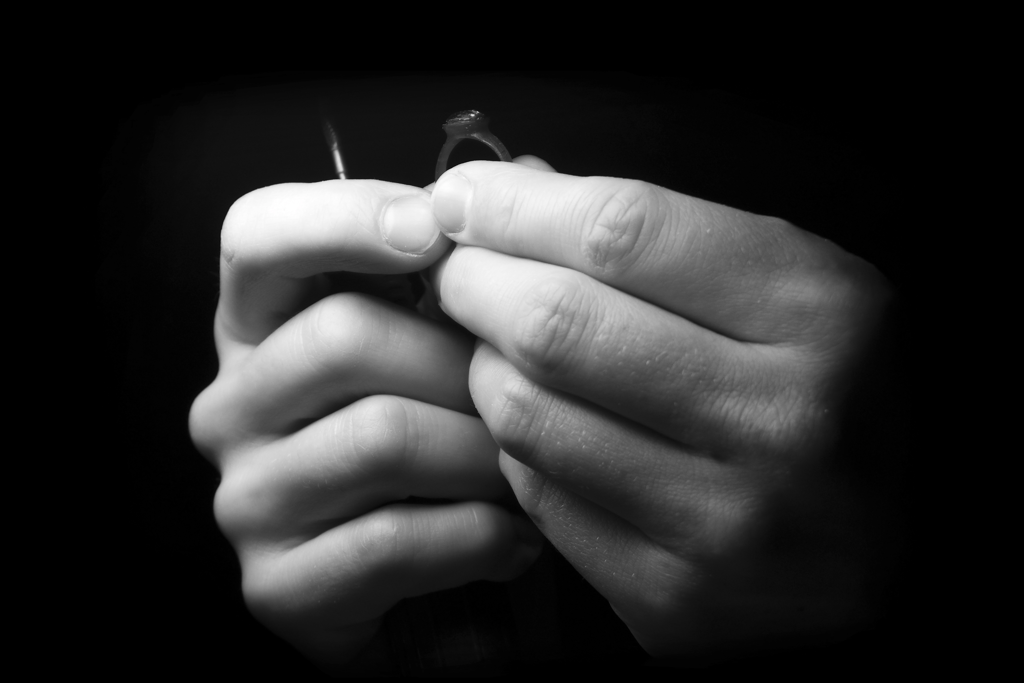 process of carving a wax model for a ring with a sapphire